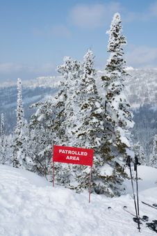 Sign Patrolled Area On Mountain Slope Stock Photography