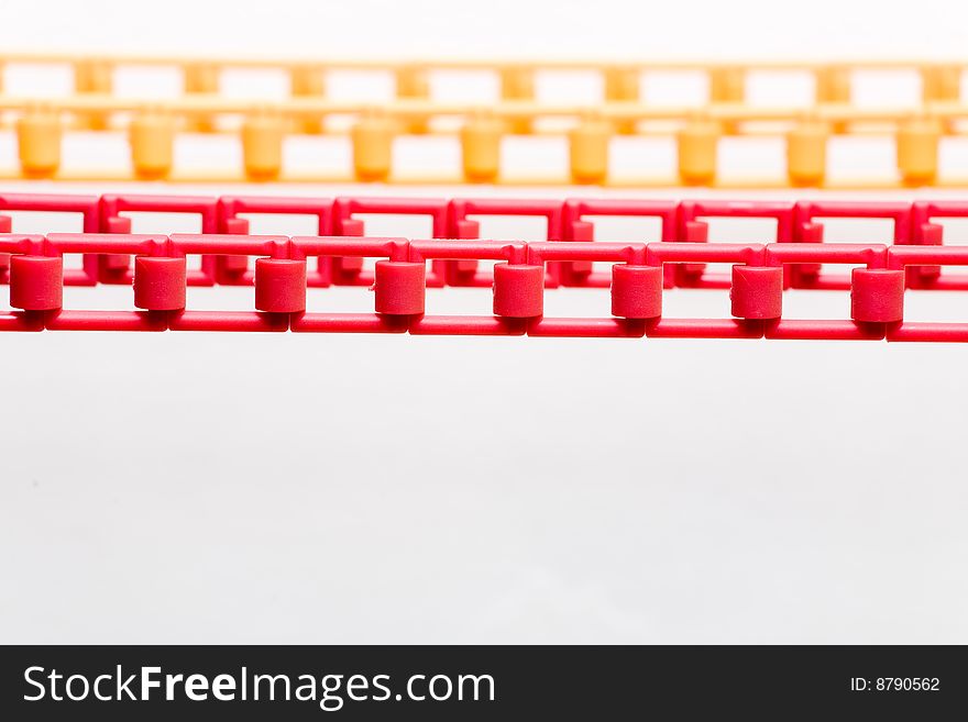 Colored red and yellow plastic chain. Colored red and yellow plastic chain