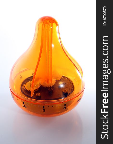 Orange Egg Timer for the Kitchen, made out of transparent plastic