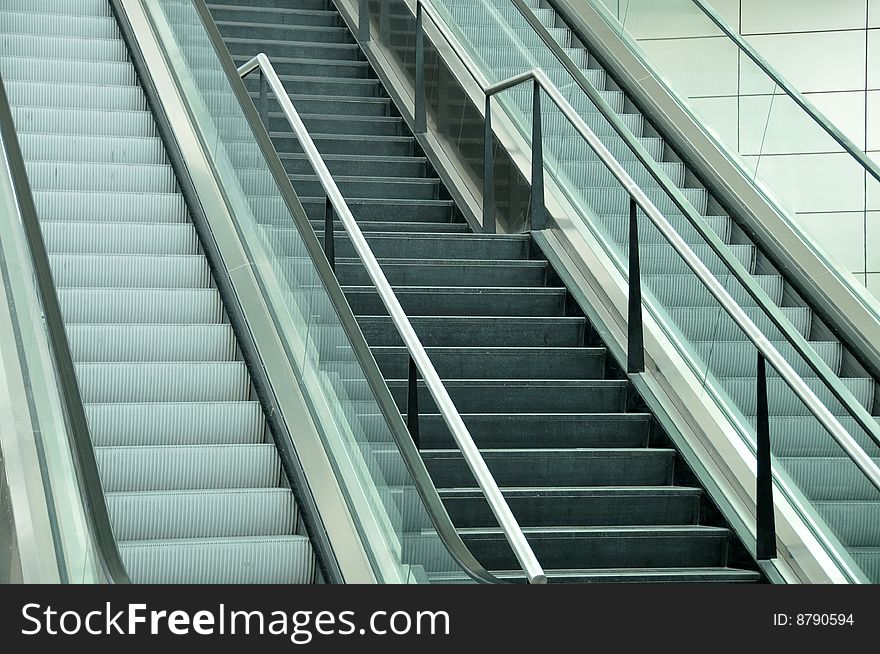 Moving escalator. Futuristic modern airport architecture