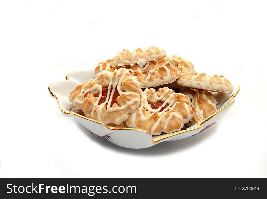 Cookies in a vase on a white isolated background