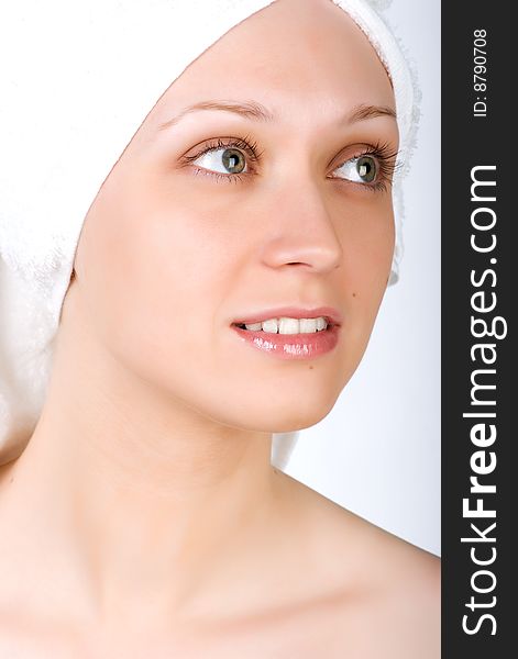 Young girl after bath with towel on her head