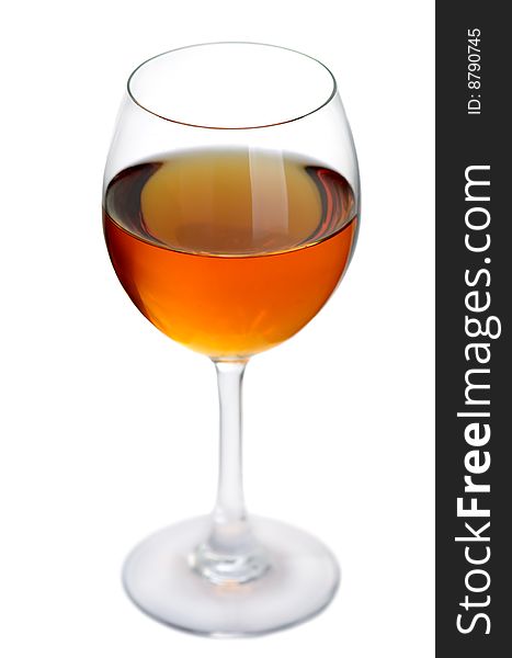 Glass of excellent white wine on a white background