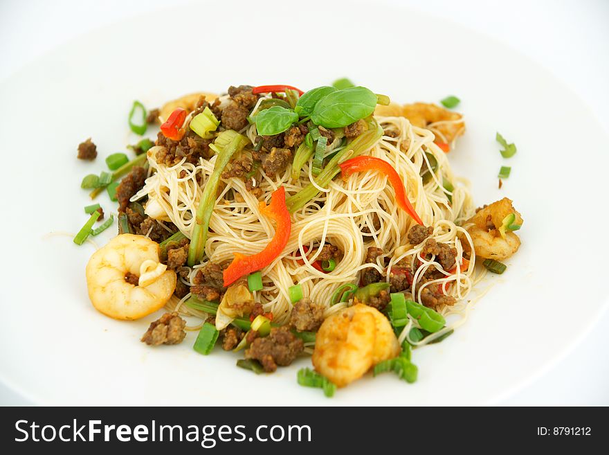 Rice noodles with shrimps minced meat, red pepper,green beans, parsley and sesame seeds. Rice noodles with shrimps minced meat, red pepper,green beans, parsley and sesame seeds