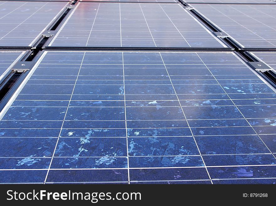 A close-up showing the detail of a silicone solar panel. A close-up showing the detail of a silicone solar panel.