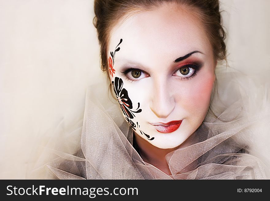 Girl With Black Flower On Face