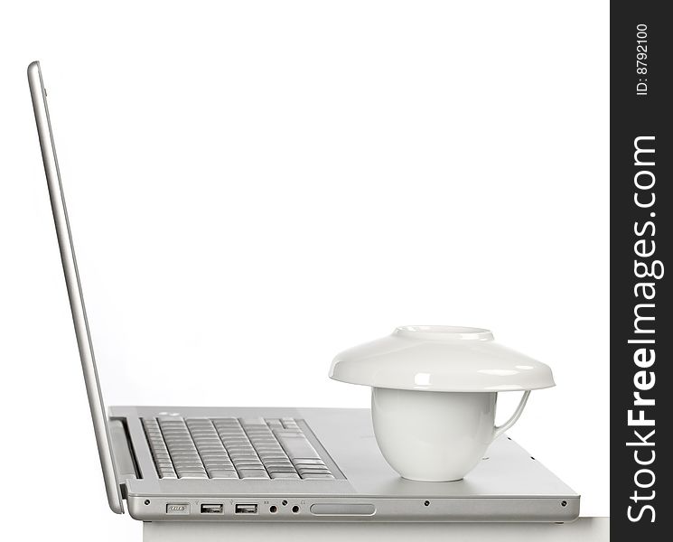 A lateral view of the cup on laptop