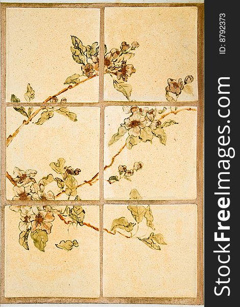 Floral pattern made from ceramic tiles - closeup wall decoration