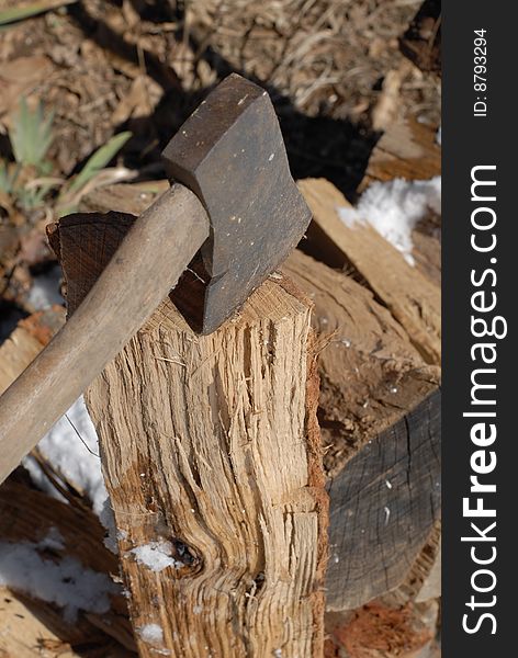 A Hatchet is used to cut small pieces of wood for fire building. A Hatchet is used to cut small pieces of wood for fire building.