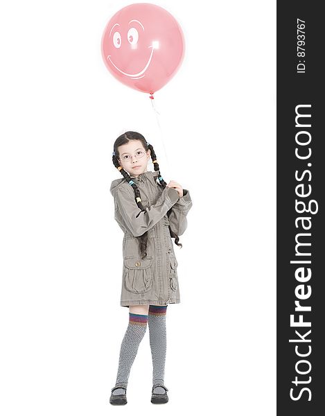 Beautiful girl with pink balloon over white