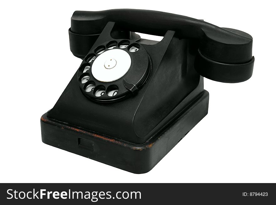 Black rotary telephone on white