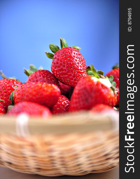 Strawberries in basket, selective focus