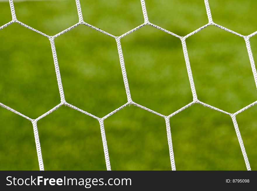 White grid of football gate on a green background. White grid of football gate on a green background.