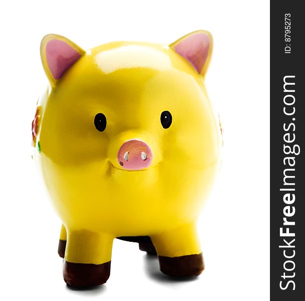 Close-up of a piggy bank isolated over white