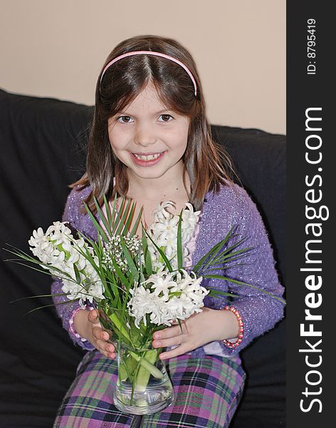 A portrait with a beautiful girl with spring flowers. A portrait with a beautiful girl with spring flowers