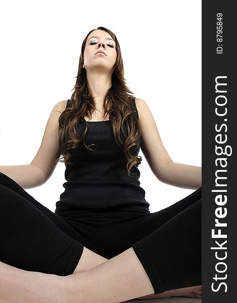 Young woman is doing an expert yoga exercise