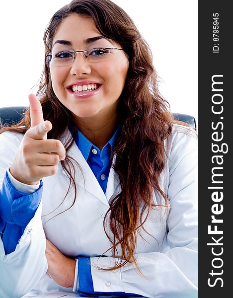 Medical Doctor smiling at camera sitting on chair