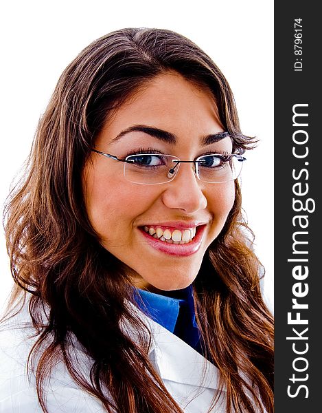 Portrait of young happy doctor against white background