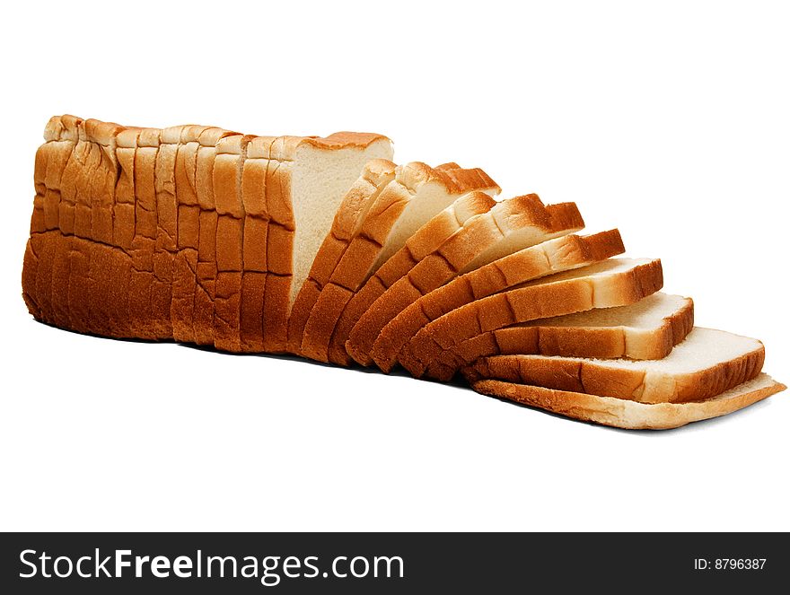 Close-up of slices of bread isolated over white