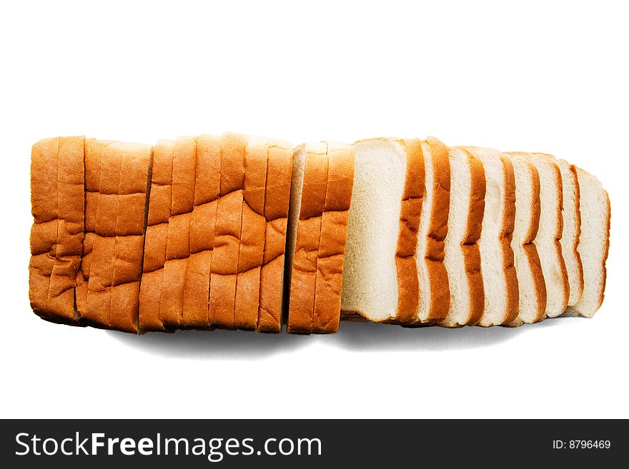 Fresh bread slices isolated over white