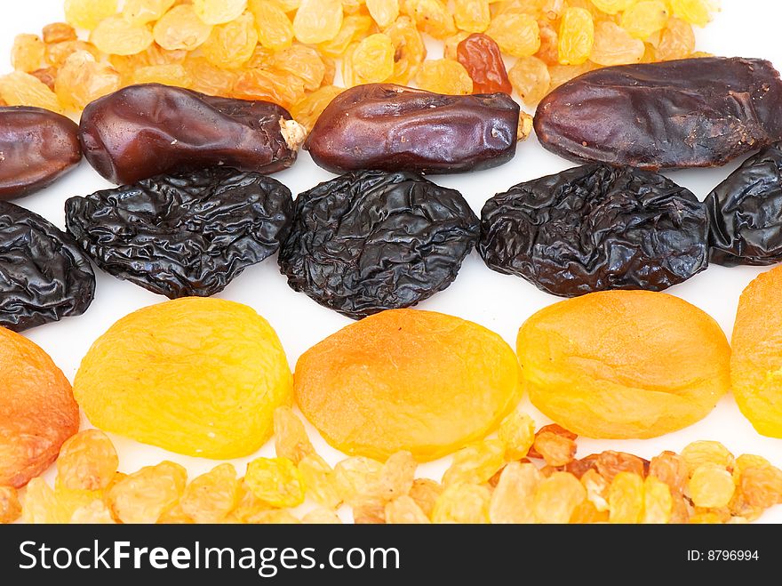 Composition from dried fruits on a light background