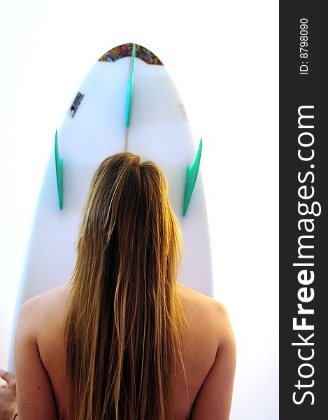 Attractive girl on white background in bikini with surfboard. Attractive girl on white background in bikini with surfboard
