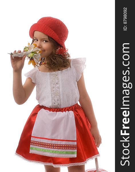 Little girl in a red dress with a bouquet of flowers in their hands. Little girl in a red dress with a bouquet of flowers in their hands