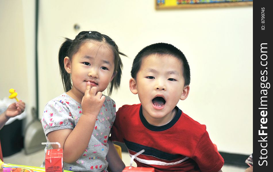 Little Chinese girl with her brother together. Little Chinese girl with her brother together.