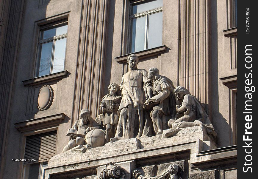 Sculptures on the facade of a historic building. Sculptures on the facade of a historic building.