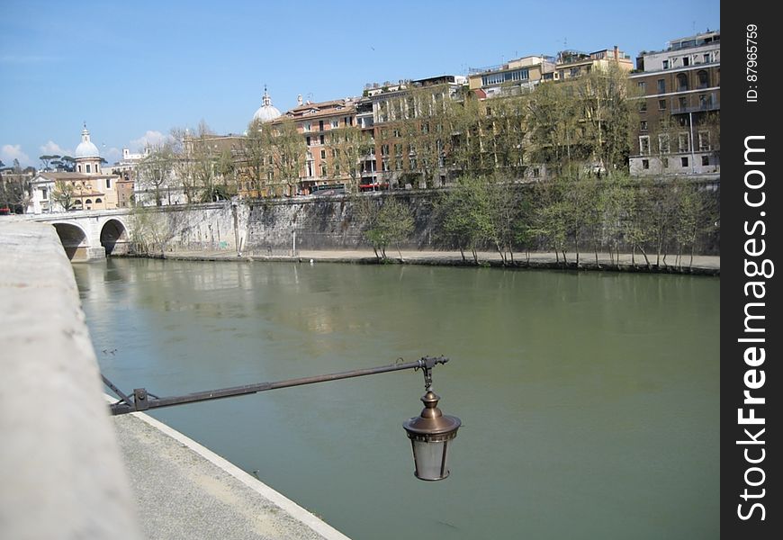 A view of a river passing through a city. A view of a river passing through a city.