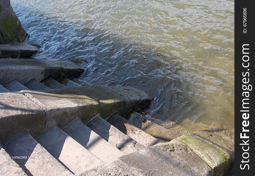 A staircase leading into the sea. A staircase leading into the sea.