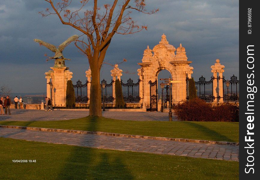 Park And Gates At Sunset