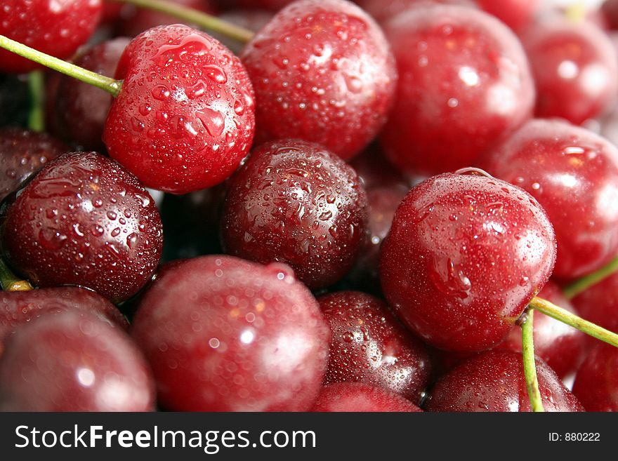 Many cherries with drop