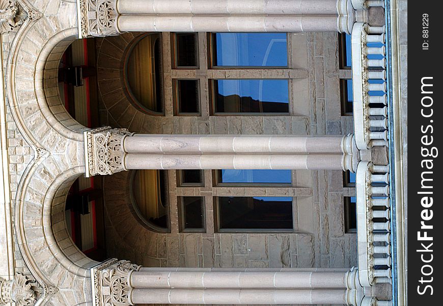 Santstone archways and windows on the historic city and county government building in Salt Lake City, Utah. Santstone archways and windows on the historic city and county government building in Salt Lake City, Utah.