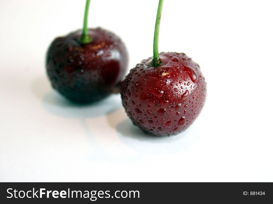 Two cherries in isolated