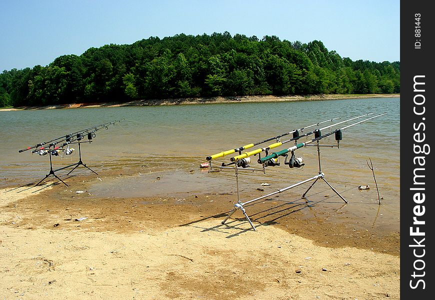 Fishing pole racks holding multiple rods. Fishing pole racks holding multiple rods