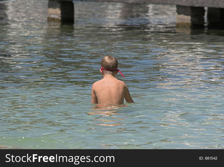 Children swimming & playing at local lake in Florida. Children swimming & playing at local lake in Florida