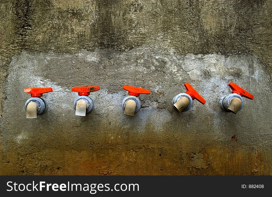 Industrial faucets with orange handles