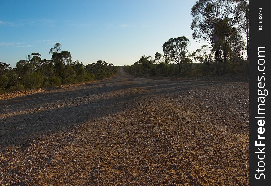 A long, straight stretch of country road in country Australia. A long, straight stretch of country road in country Australia