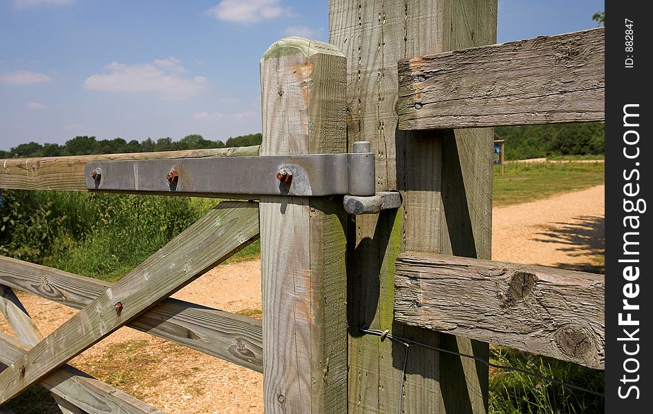 Hinge on wooden farm gate. Hinge on wooden farm gate