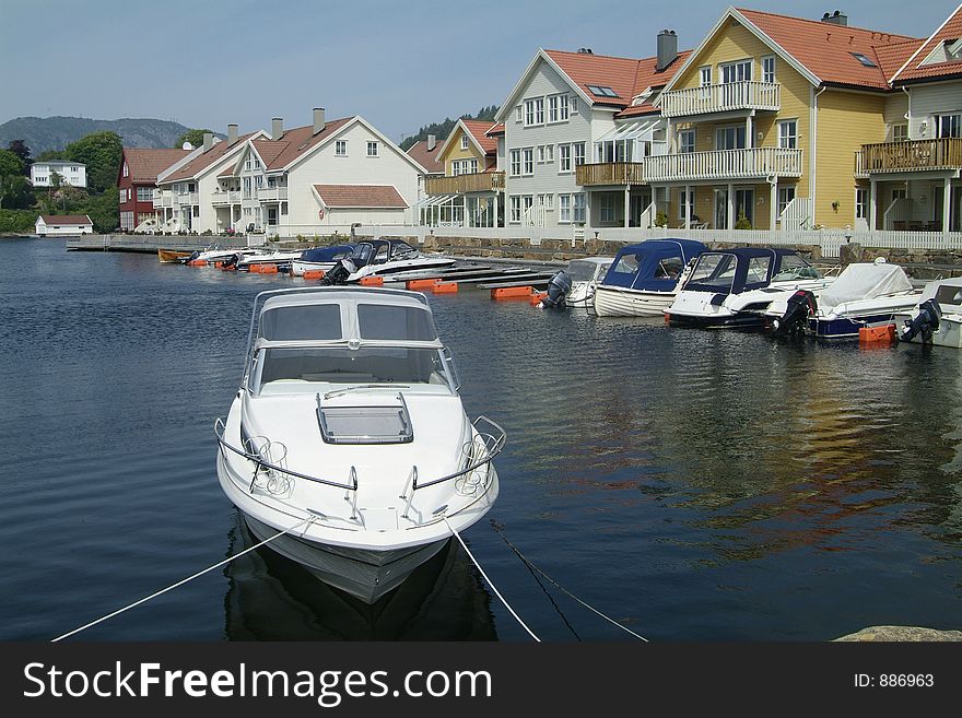 Boats And Water-front Houses