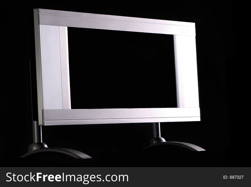 Silver plasma monitor on black background. Silver plasma monitor on black background