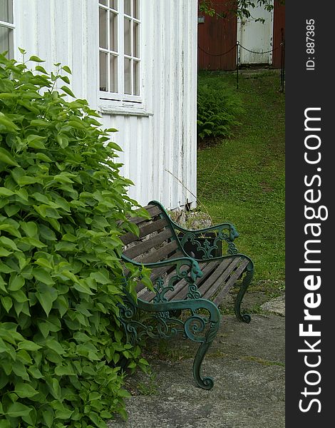 Bench and old house