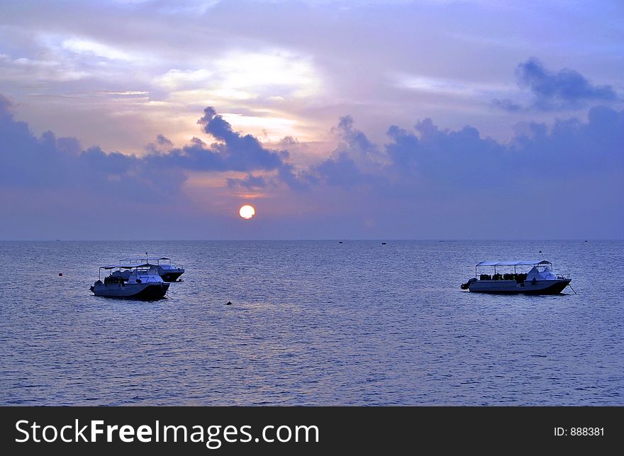 Speedboats in a dive resort anchored. Speedboats in a dive resort anchored