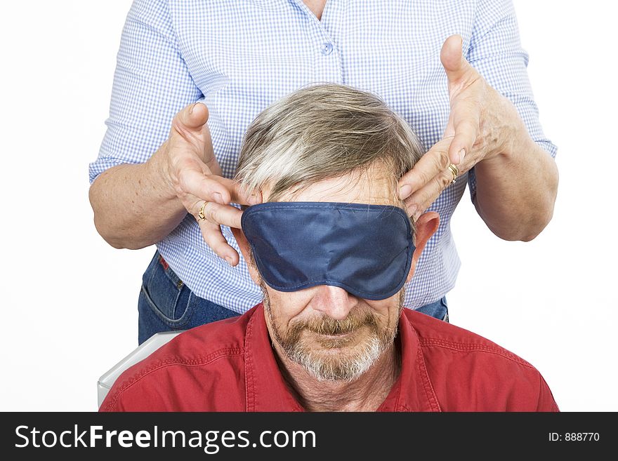 Lady giving her husband a head massage