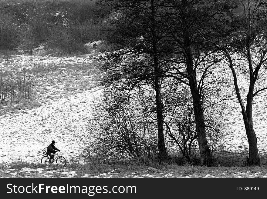 Biking in the country in winter. Biking in the country in winter