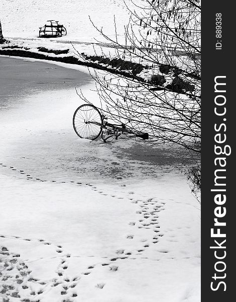 Bike on an iced lake in  in a village in denmark. Bike on an iced lake in  in a village in denmark