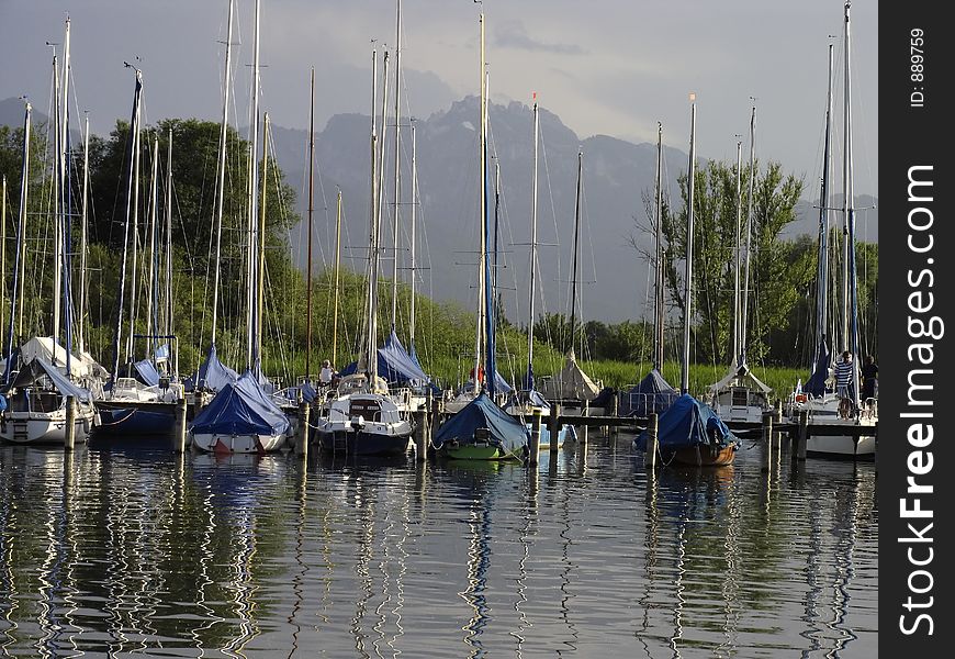 View on the Chiemsee, Bavaria, walking down post meridiem. The Alps to be seen in the background. View on the Chiemsee, Bavaria, walking down post meridiem. The Alps to be seen in the background.