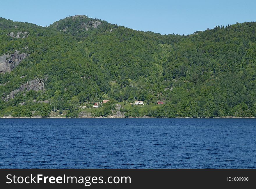 Small farm by the fjord