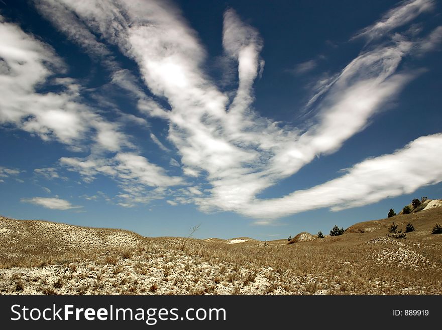 Blue sky above dunes